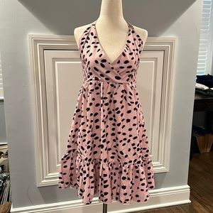 Pink and black baby doll dress with halter top.